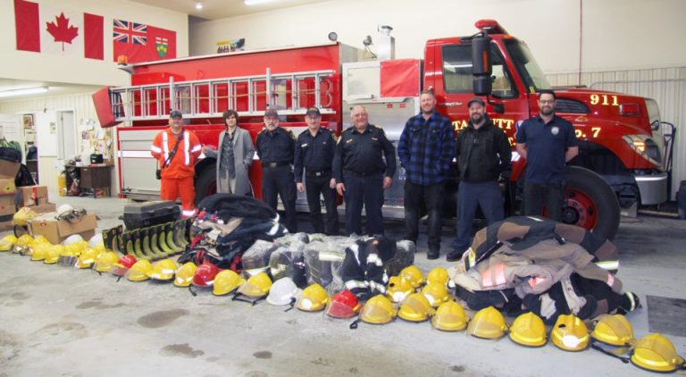Tarbutt Fire Department Captain Don Laurin, Tyson Wagner, Chief Ron Smith and Captain Dave MacDonald (Johnson Township Volunteer Fire Department), Chief Paul Ackland, Josh Tindall, Steve Whelan and Training Officer Jared Brice with surplus firefighting equipment to be sent to Ukraine, Feb. 7, 2023